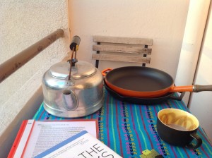 Balcony with Cast Iron Pan and Tea Kettle